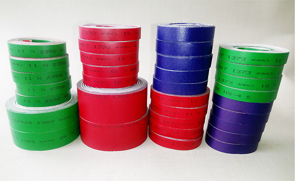 Synthetic sandwich spindle tapes